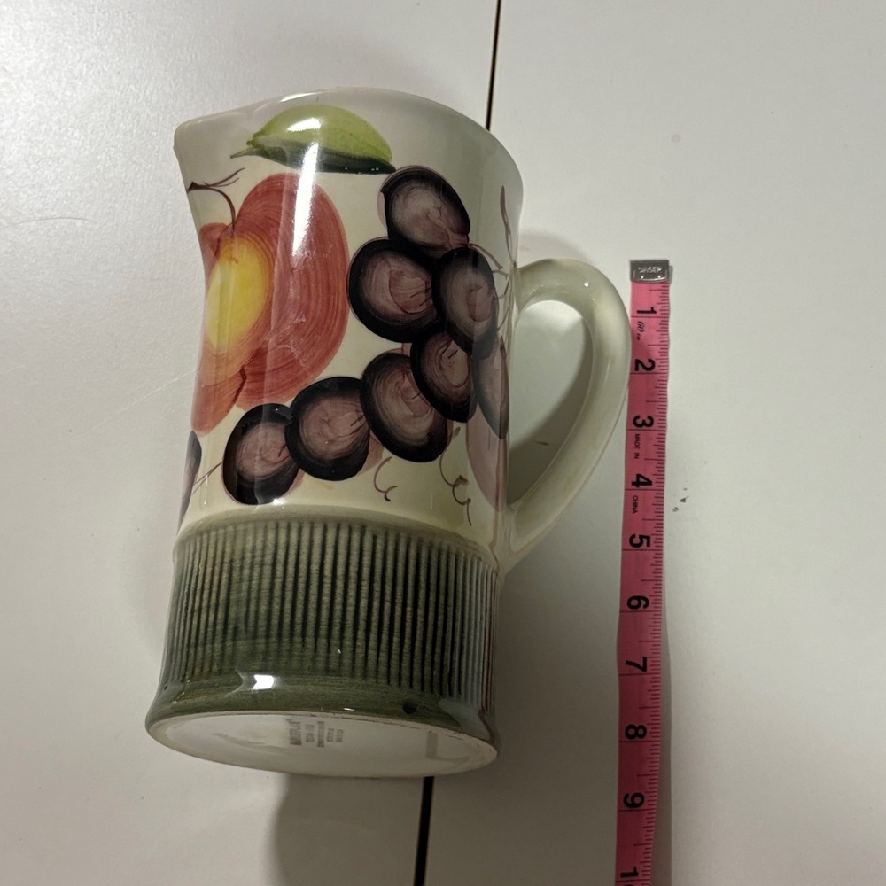 Hand painted pitcher.